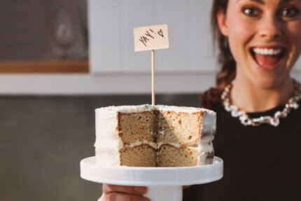 PayFast Women's Month feature a smiling lady from Macro Mixes holding a cake