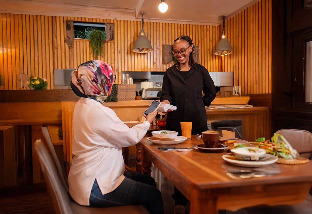 small business owner using the payfast card machine